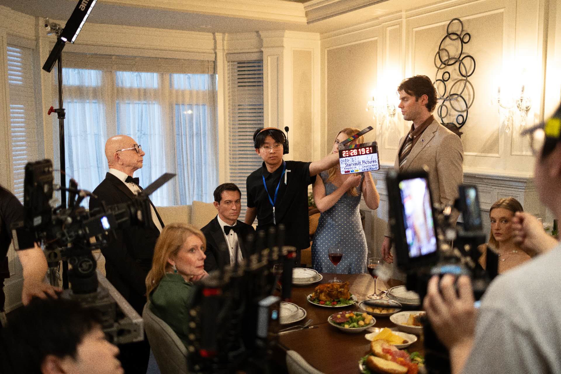 Shicheng slating a take as Second Assistant Camera on a professional narrative film set.